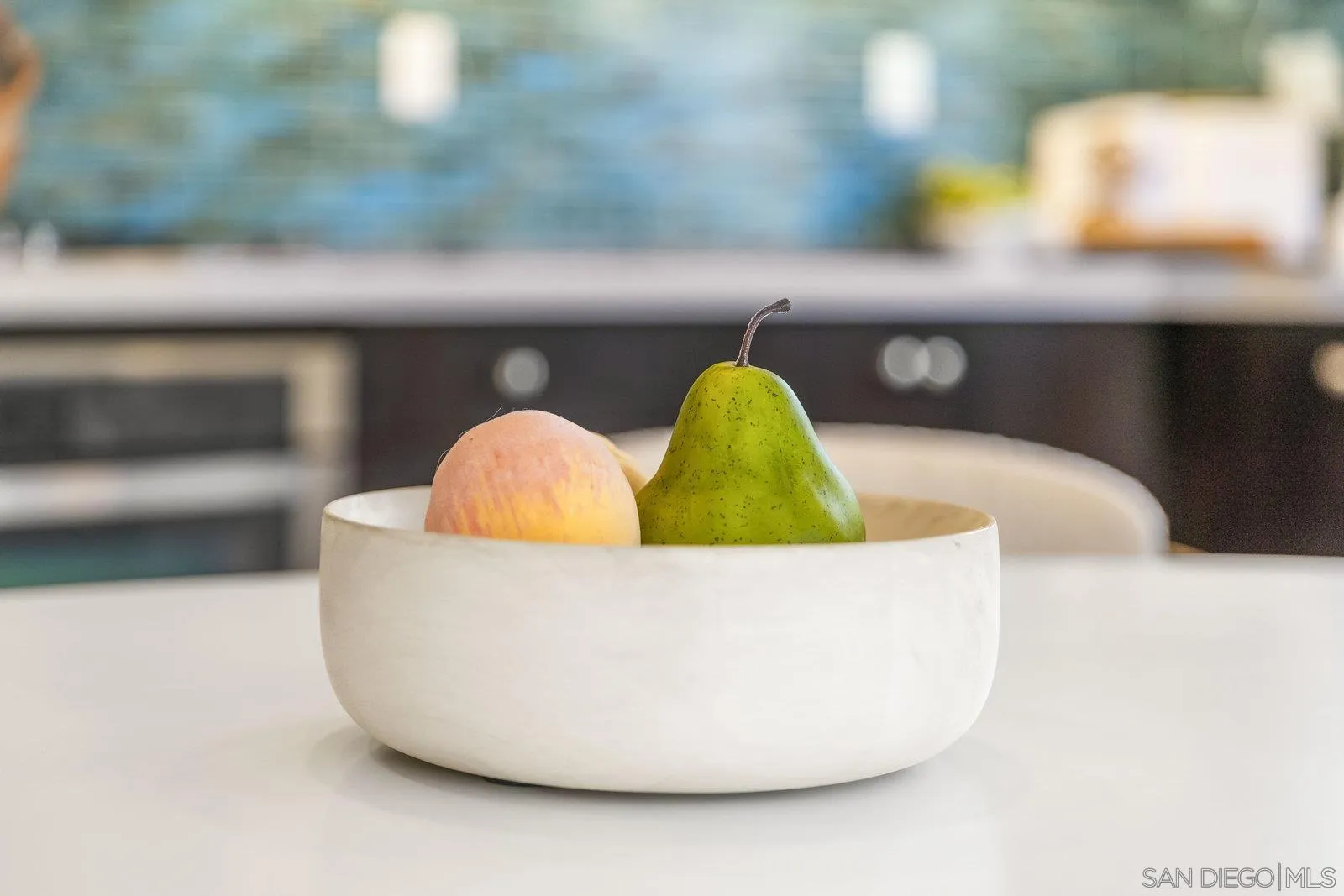 1676 Shorebreak Way Encinitas, CA 92024 - Photo 23 of 61 a living room with a couch