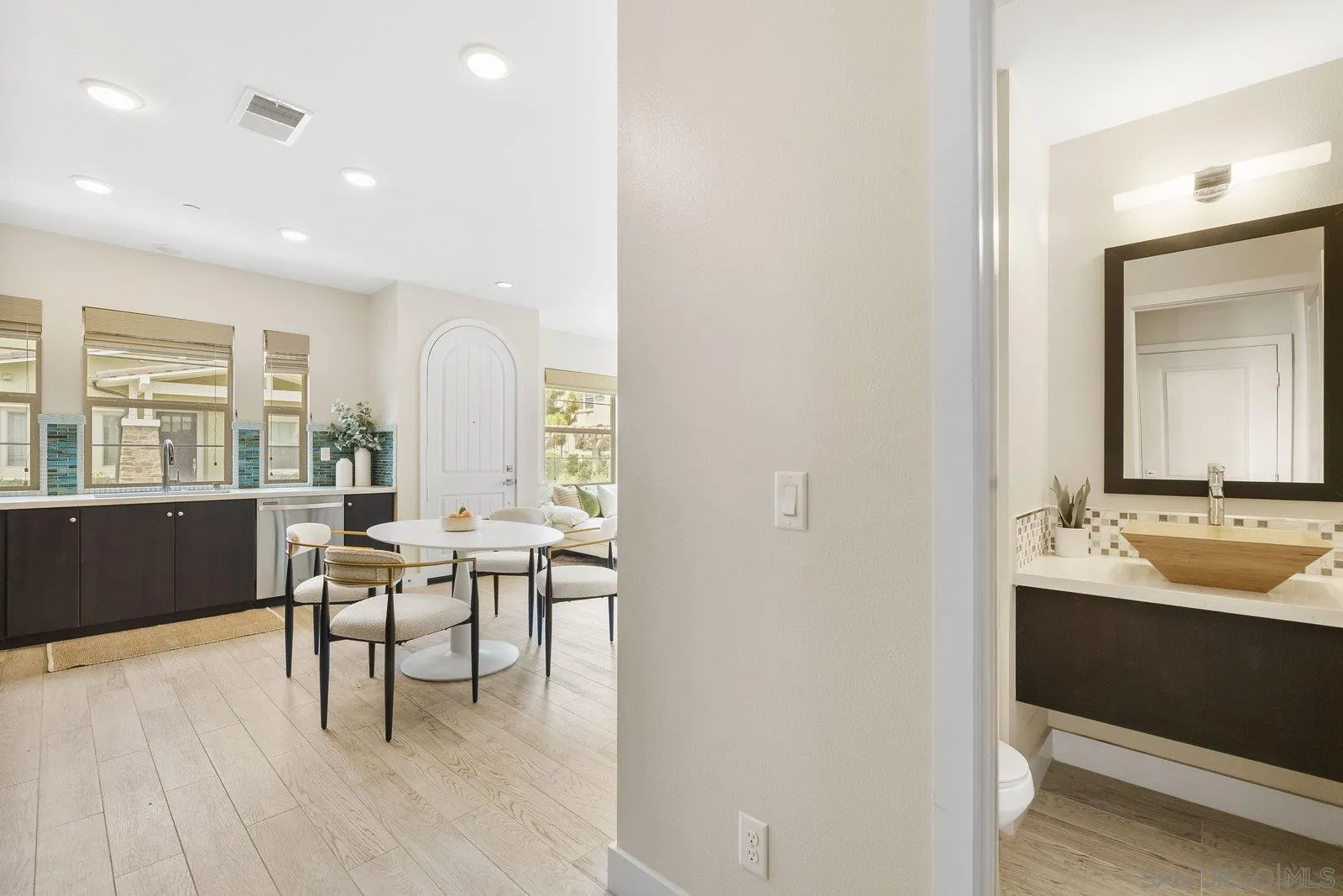1676 Shorebreak Way Encinitas, CA 92024 - Photo 27 of 61 a living room with furniture and a large window