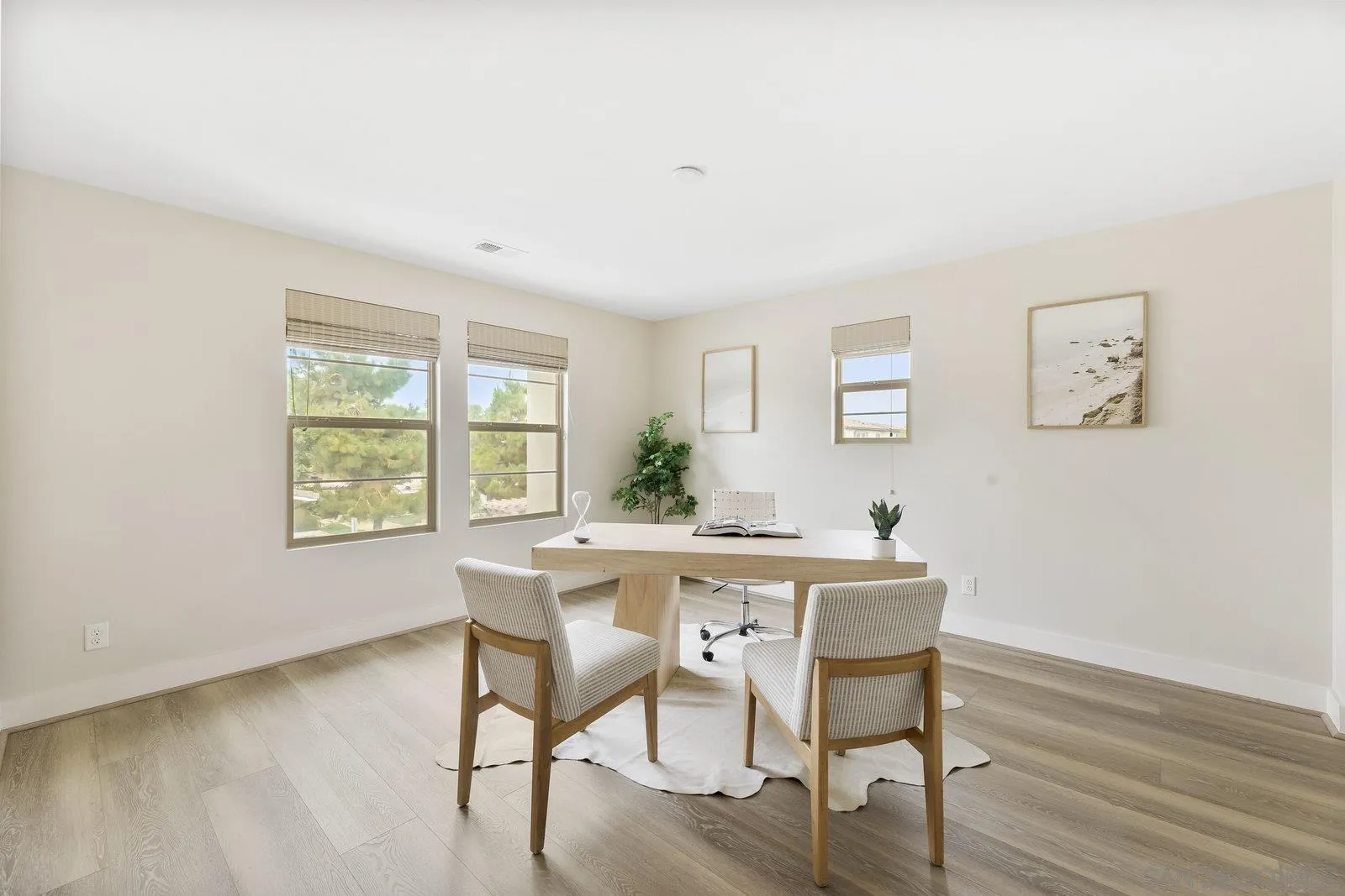 1676 Shorebreak Way Encinitas, CA 92024 - Photo 29 of 61 a view of a dining room with furniture window and wooden floor