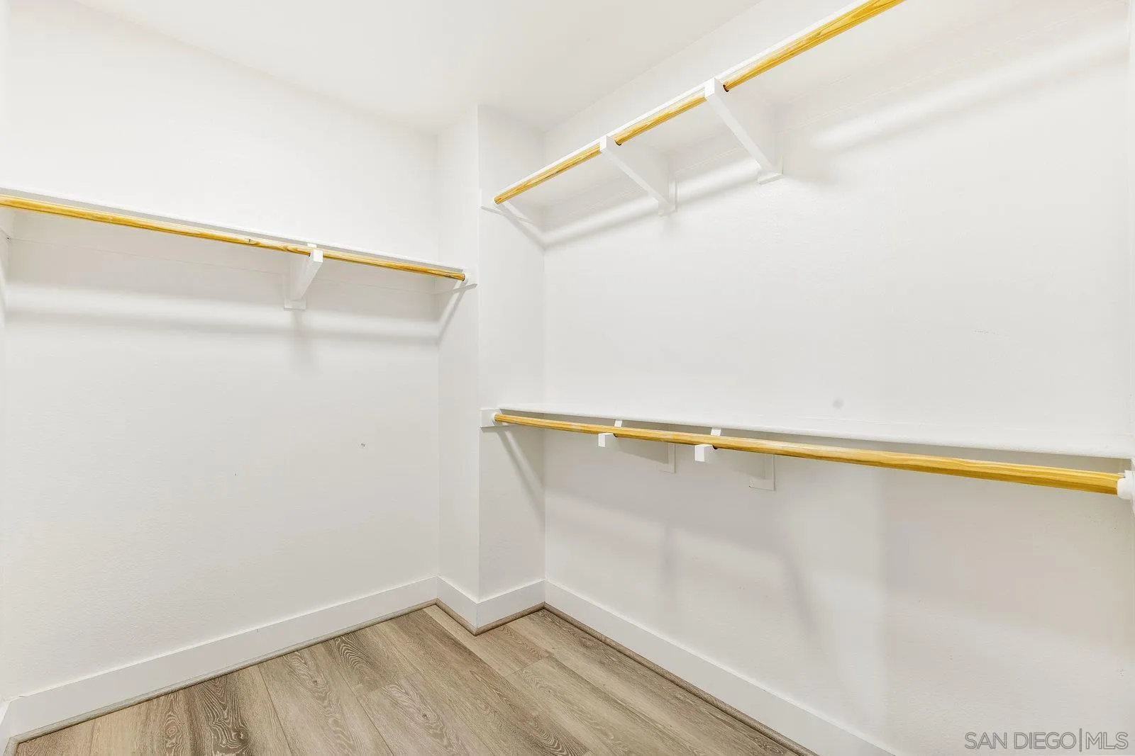 1676 Shorebreak Way Encinitas, CA 92024 - Photo 38 of 61 a view of a room with racks on the wall