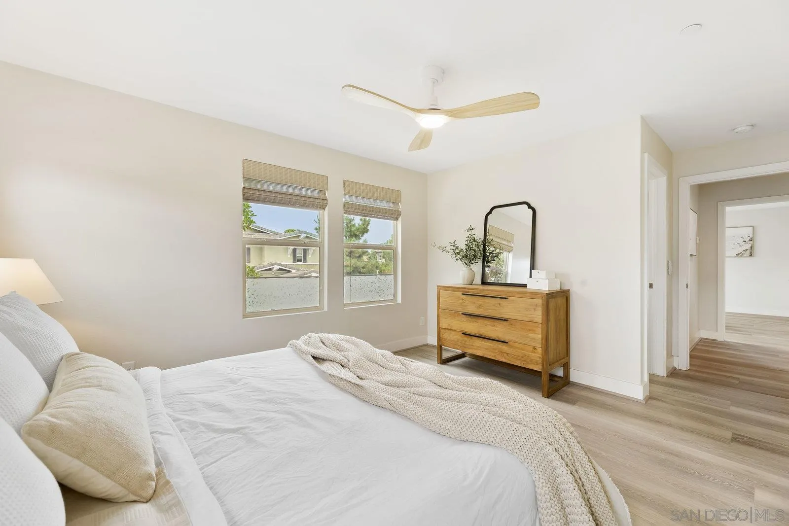 1676 Shorebreak Way Encinitas, CA 92024 - Photo 39 of 61 a bedroom with a bed and a large window