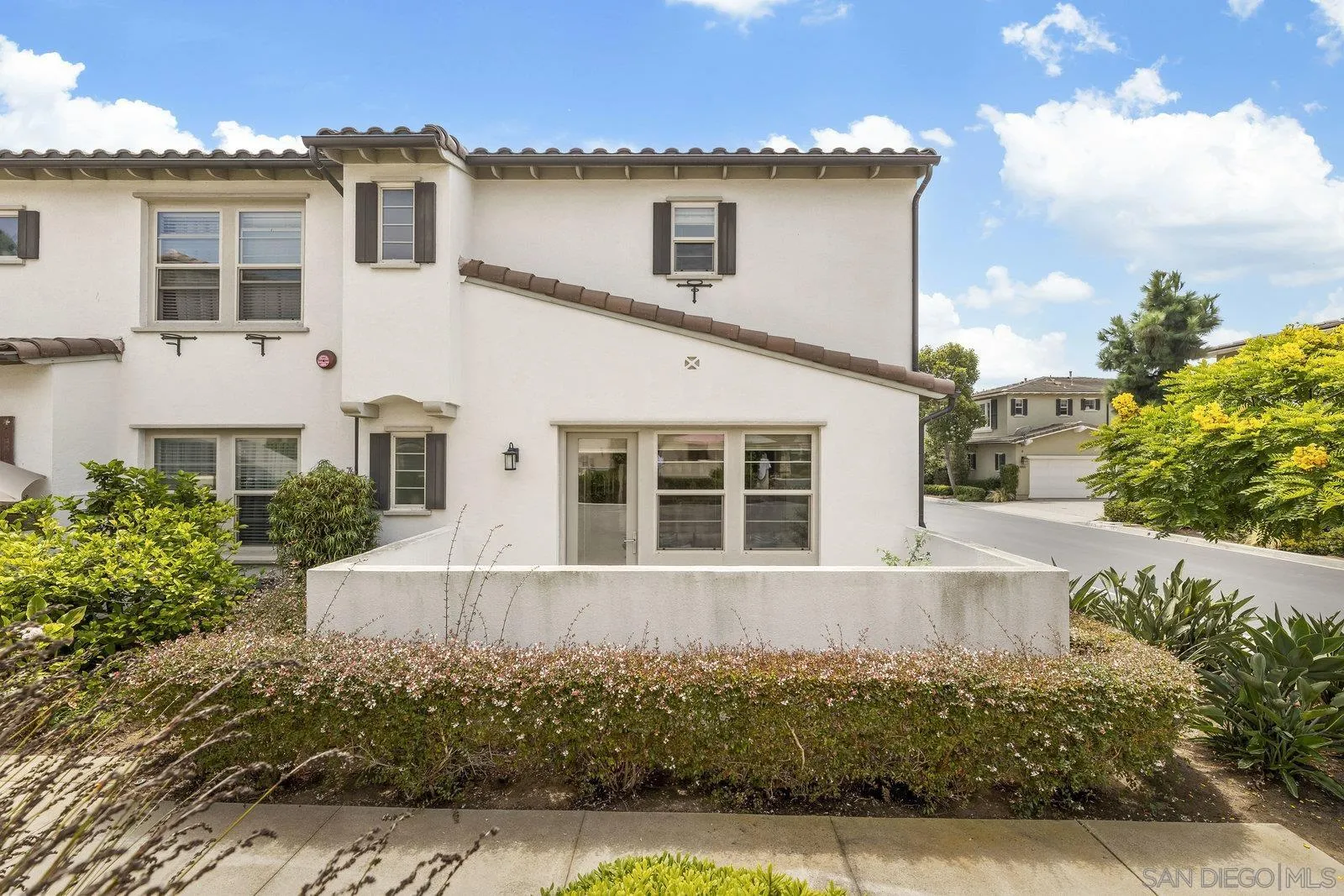 1676 Shorebreak Way Encinitas, CA 92024 - Photo 43 of 61 front view of a house with a yard