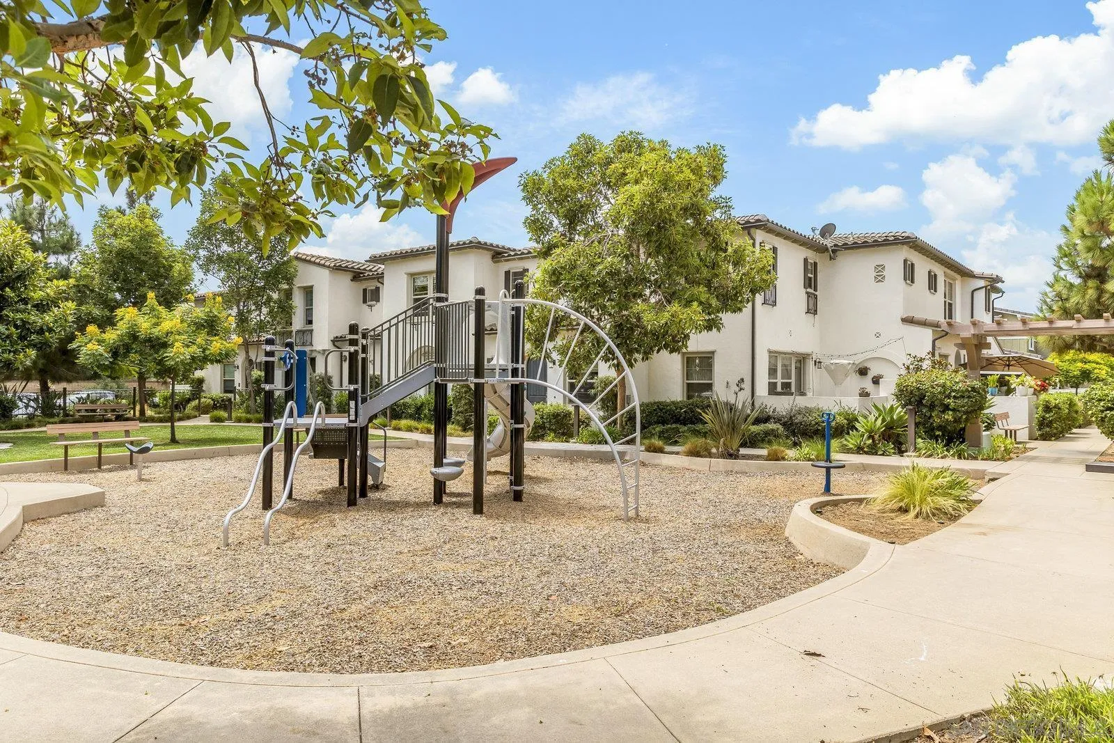 1676 Shorebreak Way Encinitas, CA 92024 - Photo 47 of 61 a view of a park with swings and slides