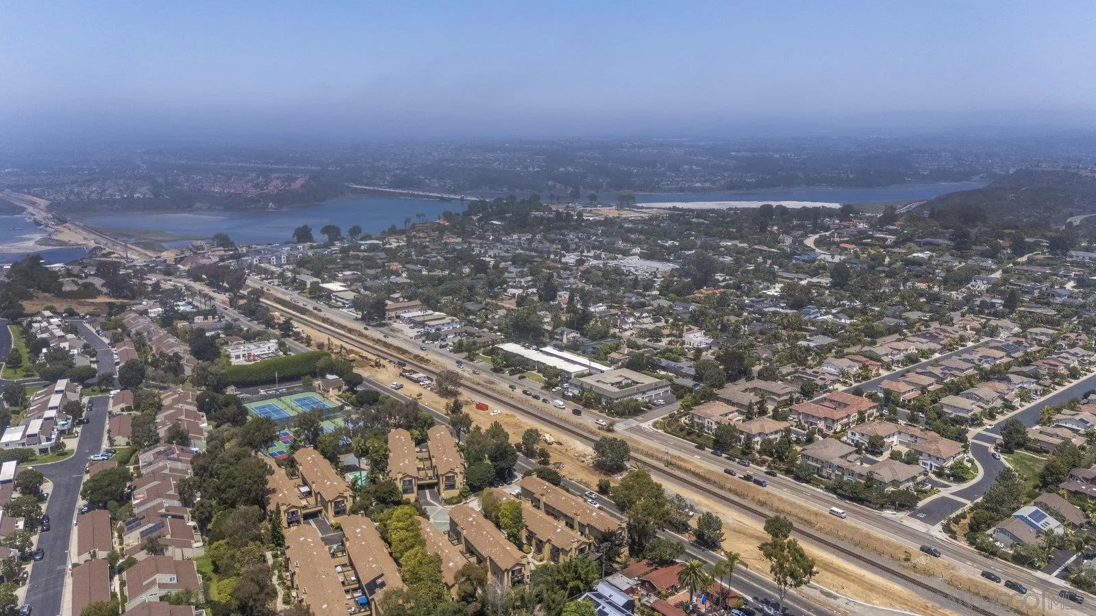1676 Shorebreak Way Encinitas, CA 92024 - Photo 60 of 61 an aerial view of house with yard and mountain view in back