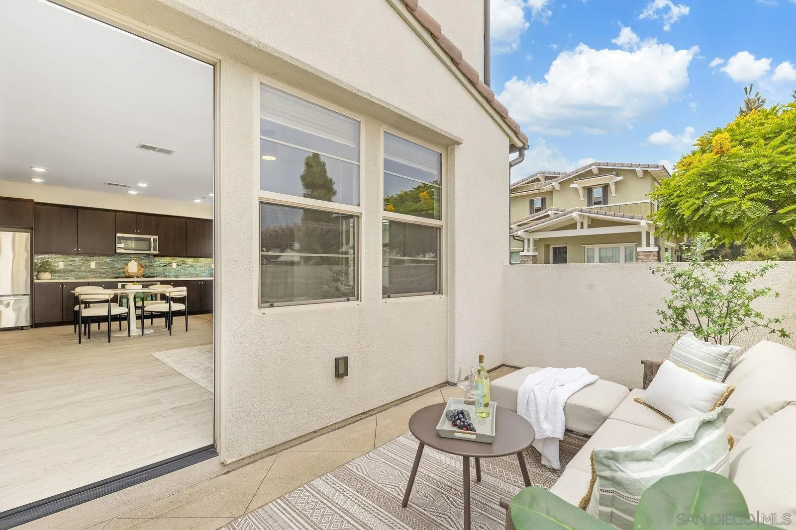 1676 Shorebreak Way Encinitas, CA 92024 - Photo 9 of 61 a living room with furniture and a potted plant
