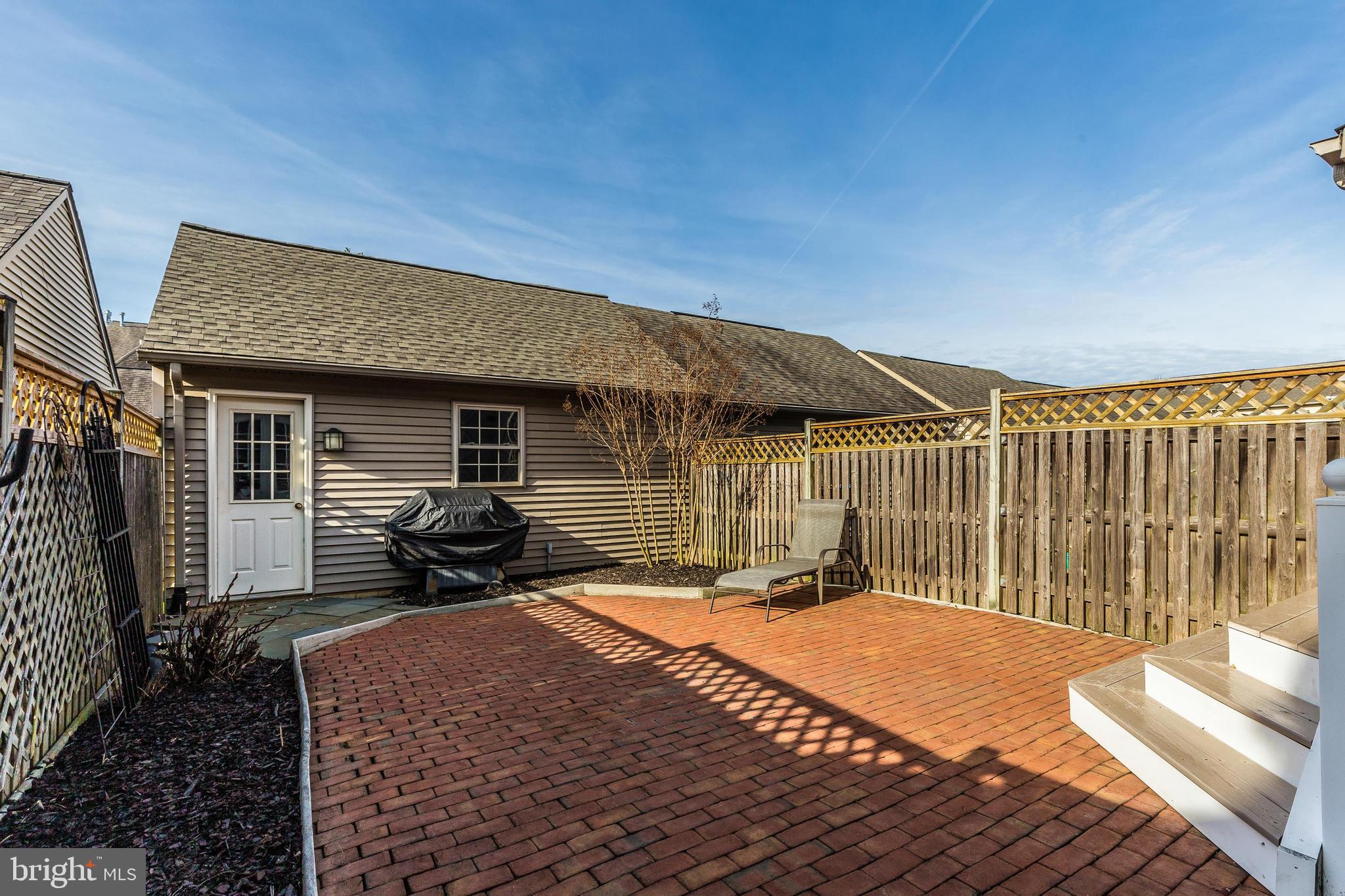 2439 Rippling Brook Road Frederick, MD 21701 - Photo 35 of 38 Rear Patio w/Access to 2-Car Garage