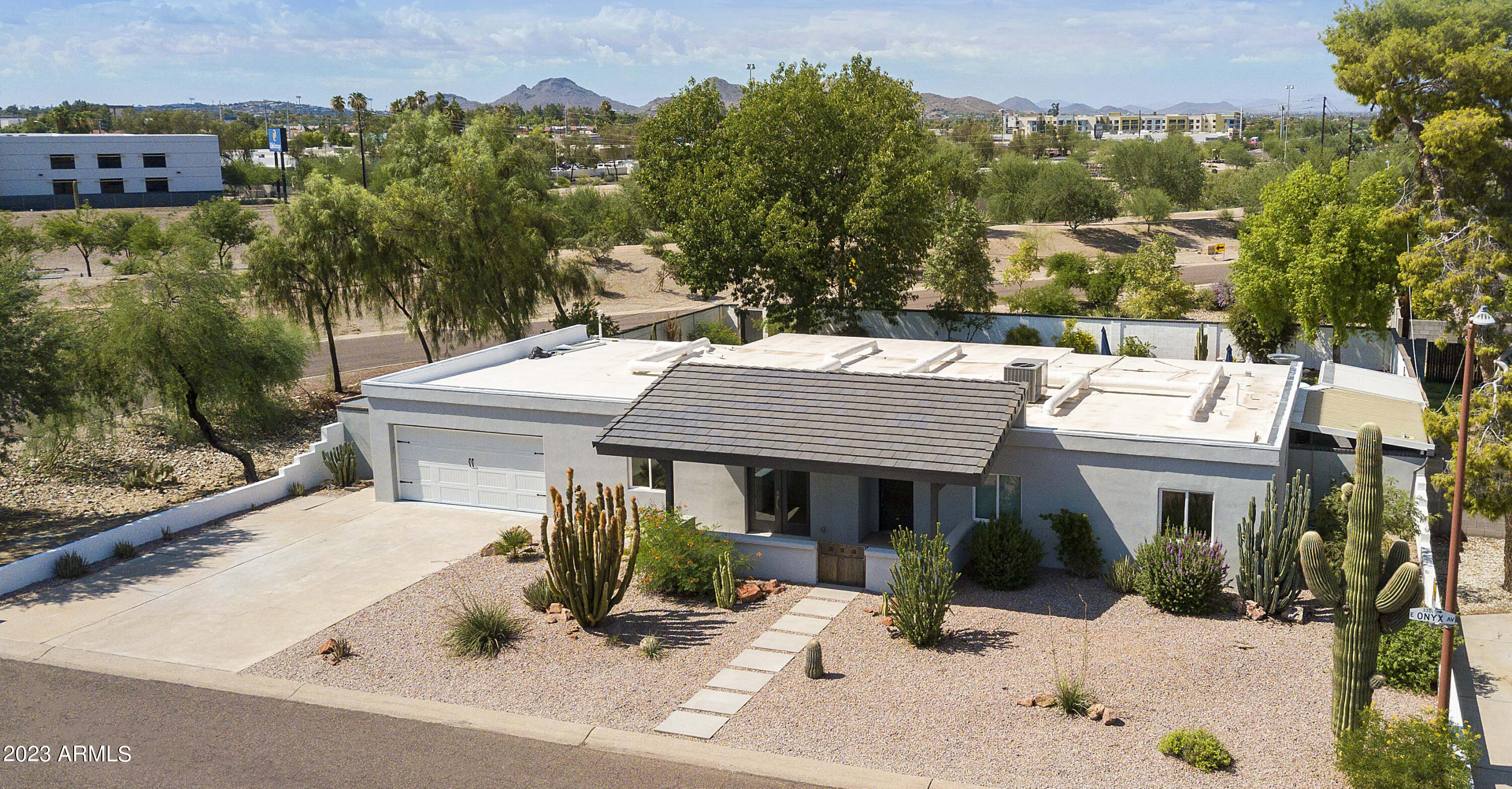 3318 East Onyx Avenue Phoenix, AZ 85028 - Photo 27 of 55 an aerial view of a house with a yard