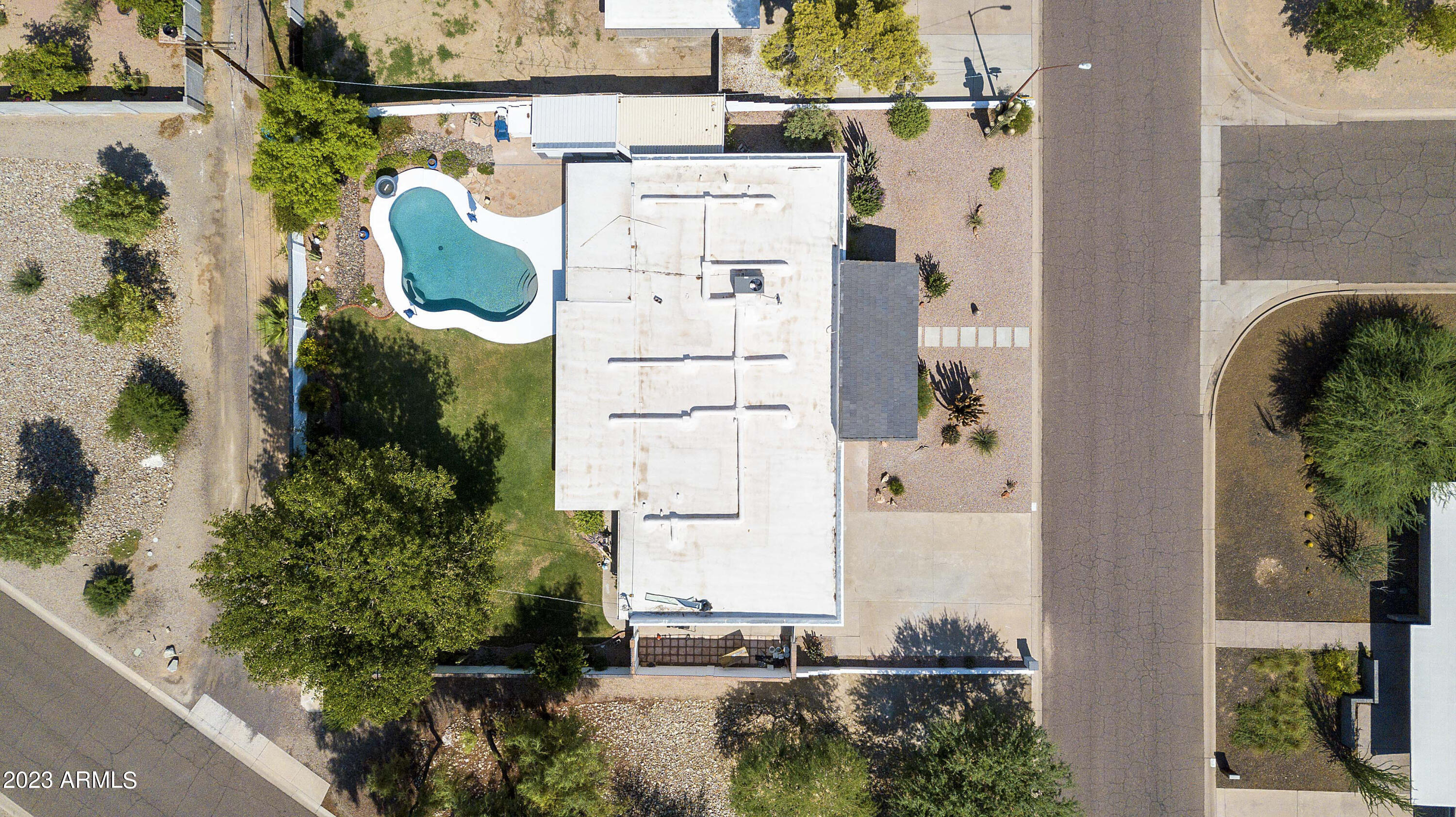 3318 East Onyx Avenue Phoenix, AZ 85028 - Photo 28 of 55 an aerial view of residential house with outdoor space and swimming pool