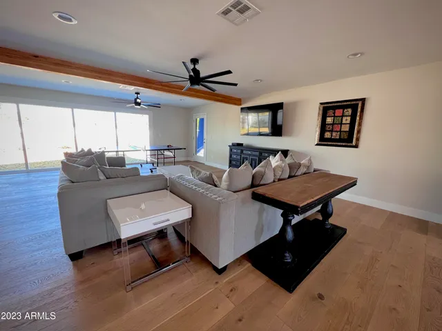 a room with table and chairs