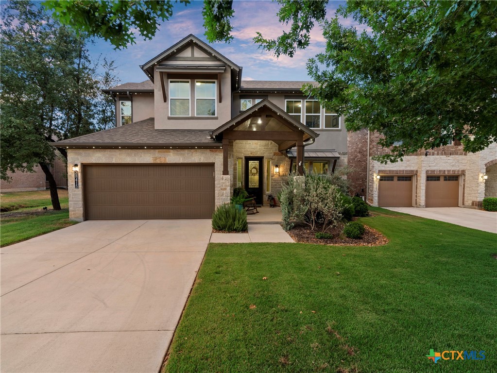 28415 Willis Ranch San Antonio, TX 78260 - Photo 1 of 48 a front view of a house with a yard and garage