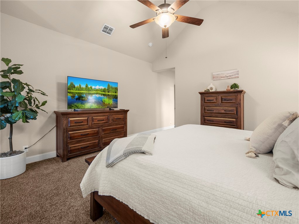 28415 Willis Ranch San Antonio, TX 78260 - Photo 17 of 48 a bedroom with a bed and a flat screen tv