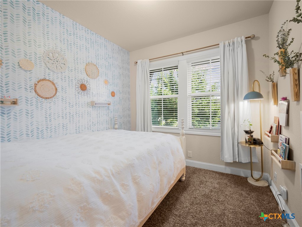 28415 Willis Ranch San Antonio, TX 78260 - Photo 26 of 48 a bedroom with a bed and a window