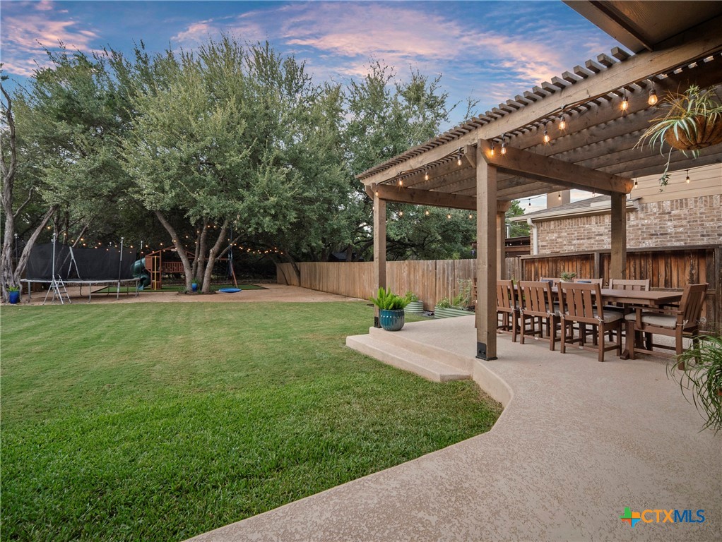 28415 Willis Ranch San Antonio, TX 78260 - Photo 34 of 48 a view of a house with backyard and sitting area