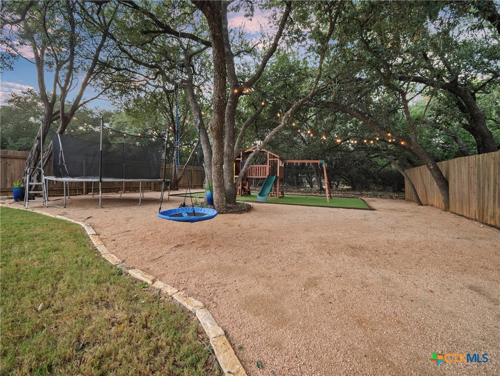 28415 Willis Ranch San Antonio, TX 78260 - Photo 36 of 48 a view of outdoor space with playground and green space