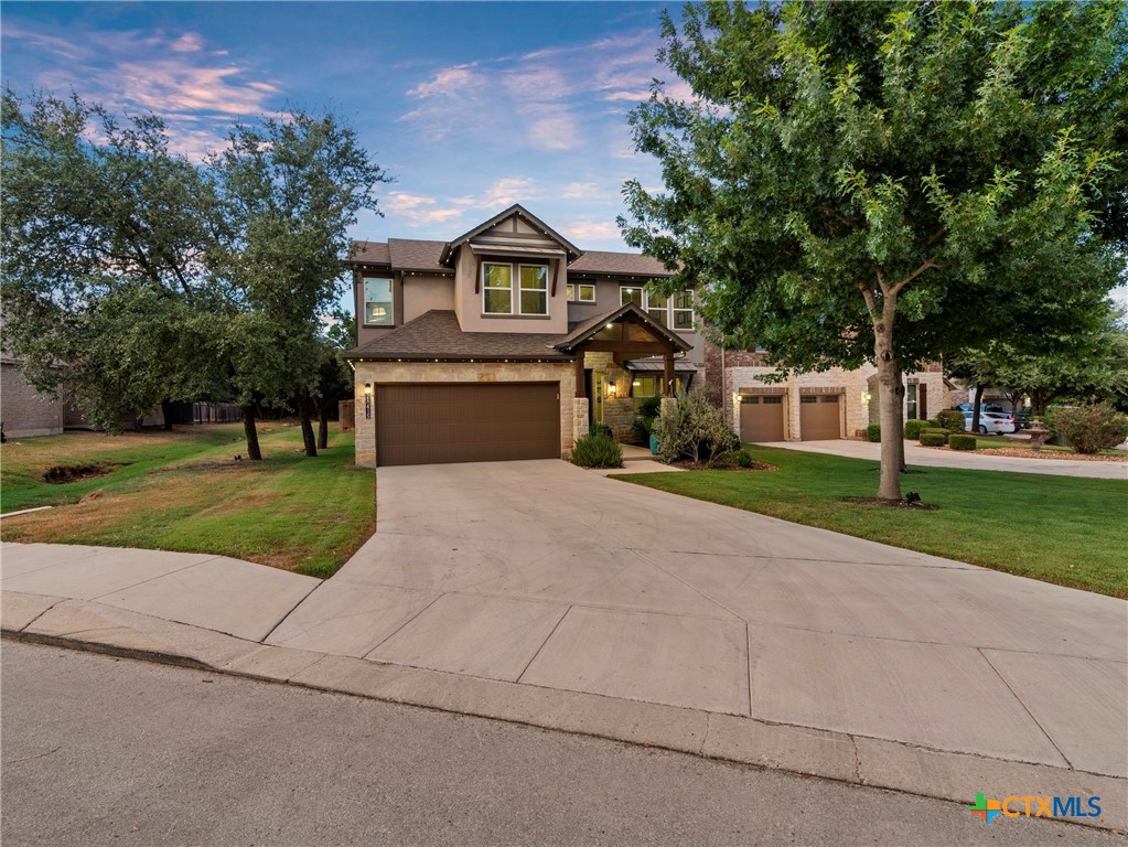28415 Willis Ranch San Antonio, TX 78260 - Photo 44 of 48 a front view of a house with a yard and garage