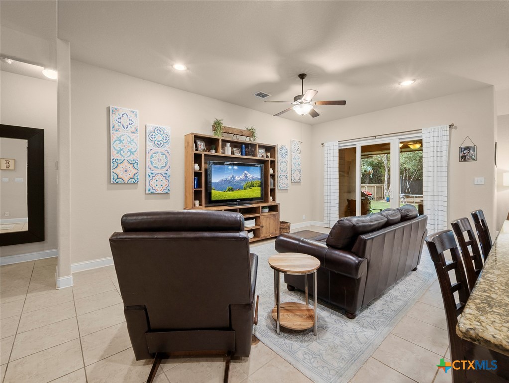 28415 Willis Ranch San Antonio, TX 78260 - Photo 8 of 48 a living room with furniture and a flat screen tv