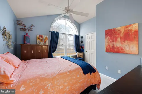 a view of an entryway with wooden floor and door