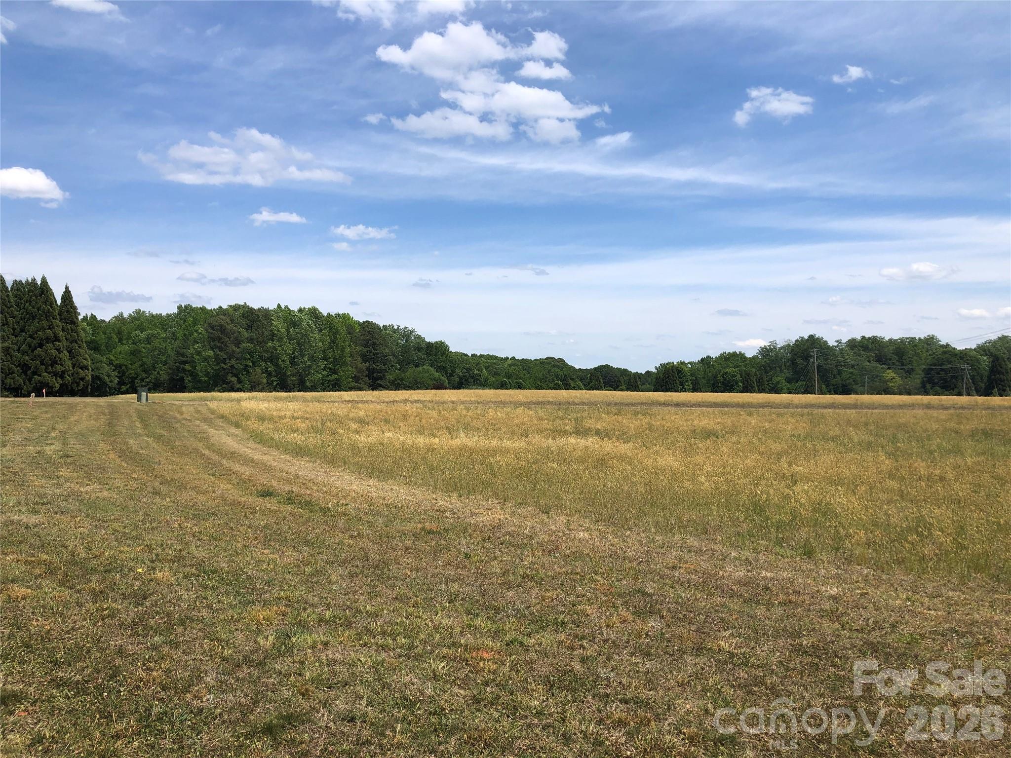 15904 Oxer Road, Unit 27A Mint Hill, NC 28227 - Photo 2 of 10 a view of lake and mountain