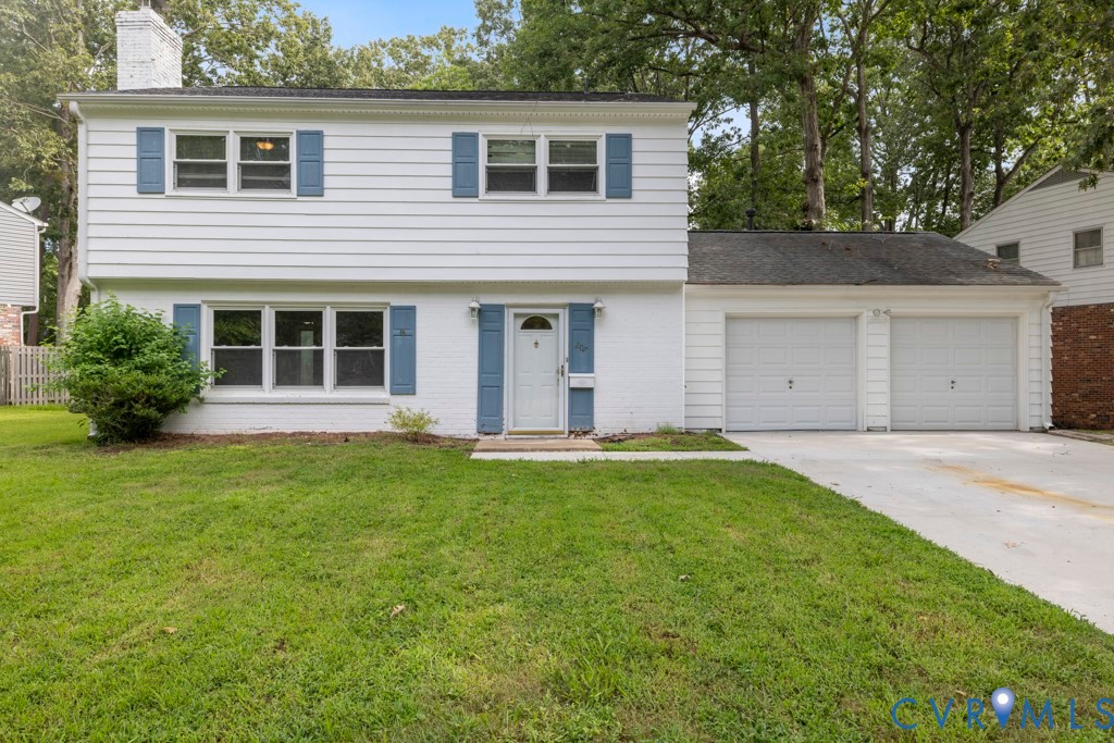 207 Missionary Ridge Hampton, VA 23669 - Photo 1 of 32 White exterior siding with blue window shutters