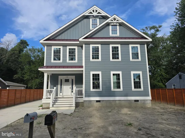 a front view of a house with porch