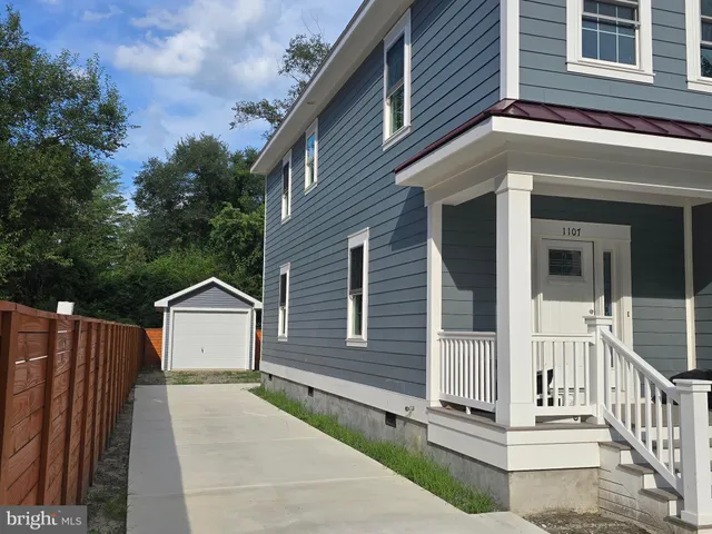 a front view of a house with a porch
