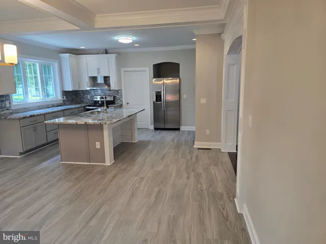 a bathroom with a toilet and a sink