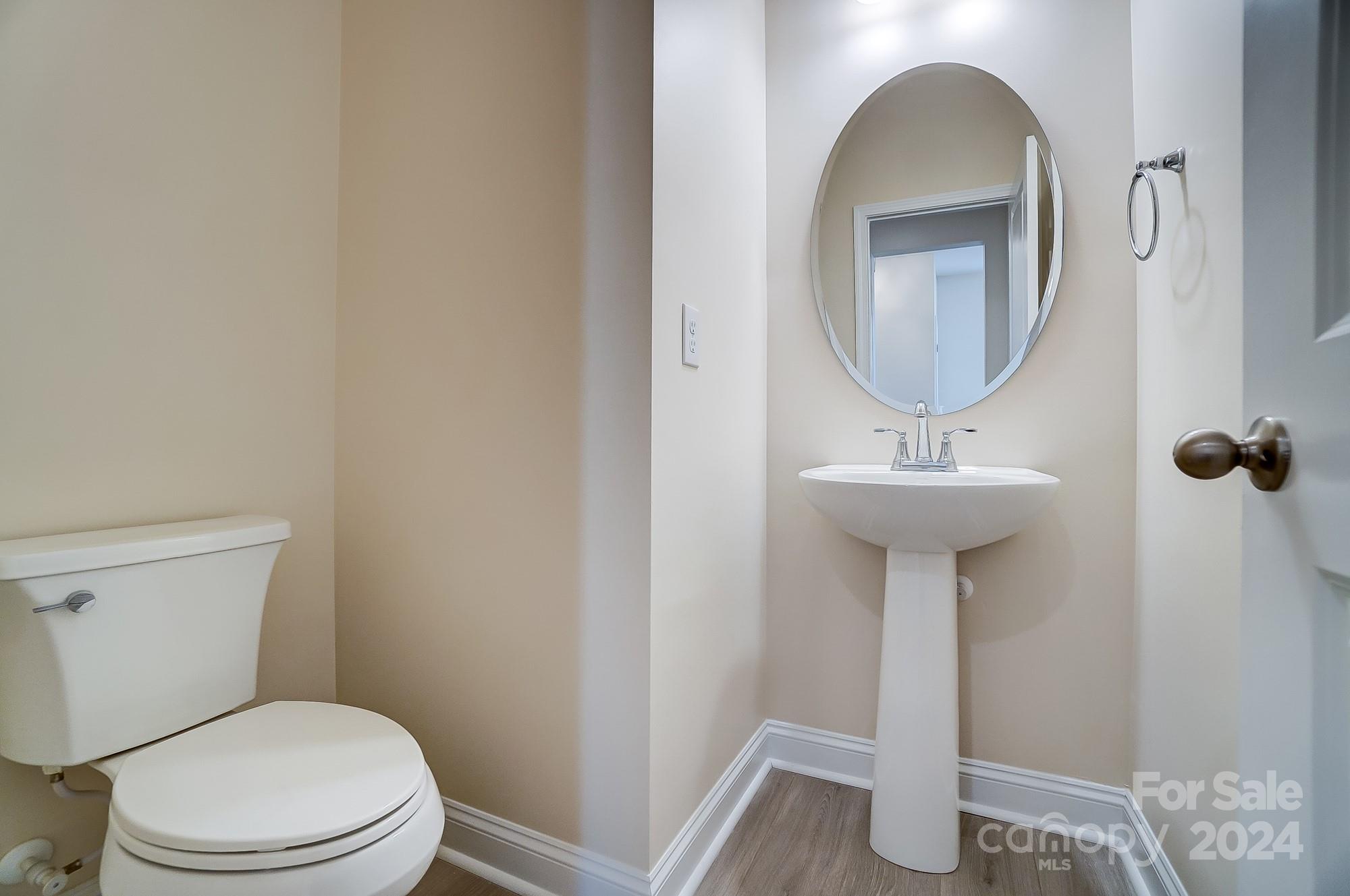 2059 Suttonview Road Fort Mill, SC 29708 - Photo 22 of 44 a bathroom with a sink toilet and a mirror