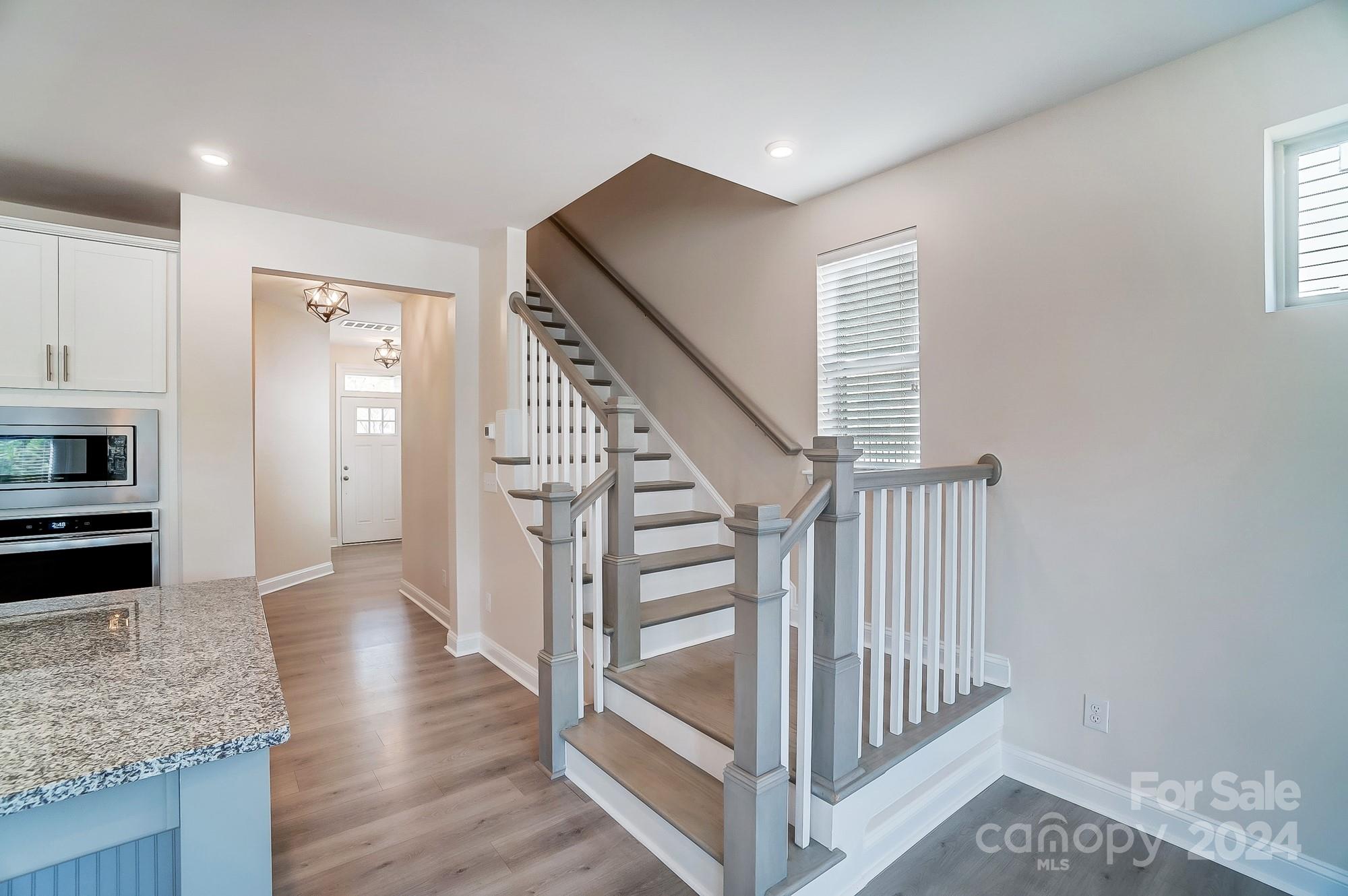 2059 Suttonview Road Fort Mill, SC 29708 - Photo 23 of 44 a view of entryway and hall with wooden floor