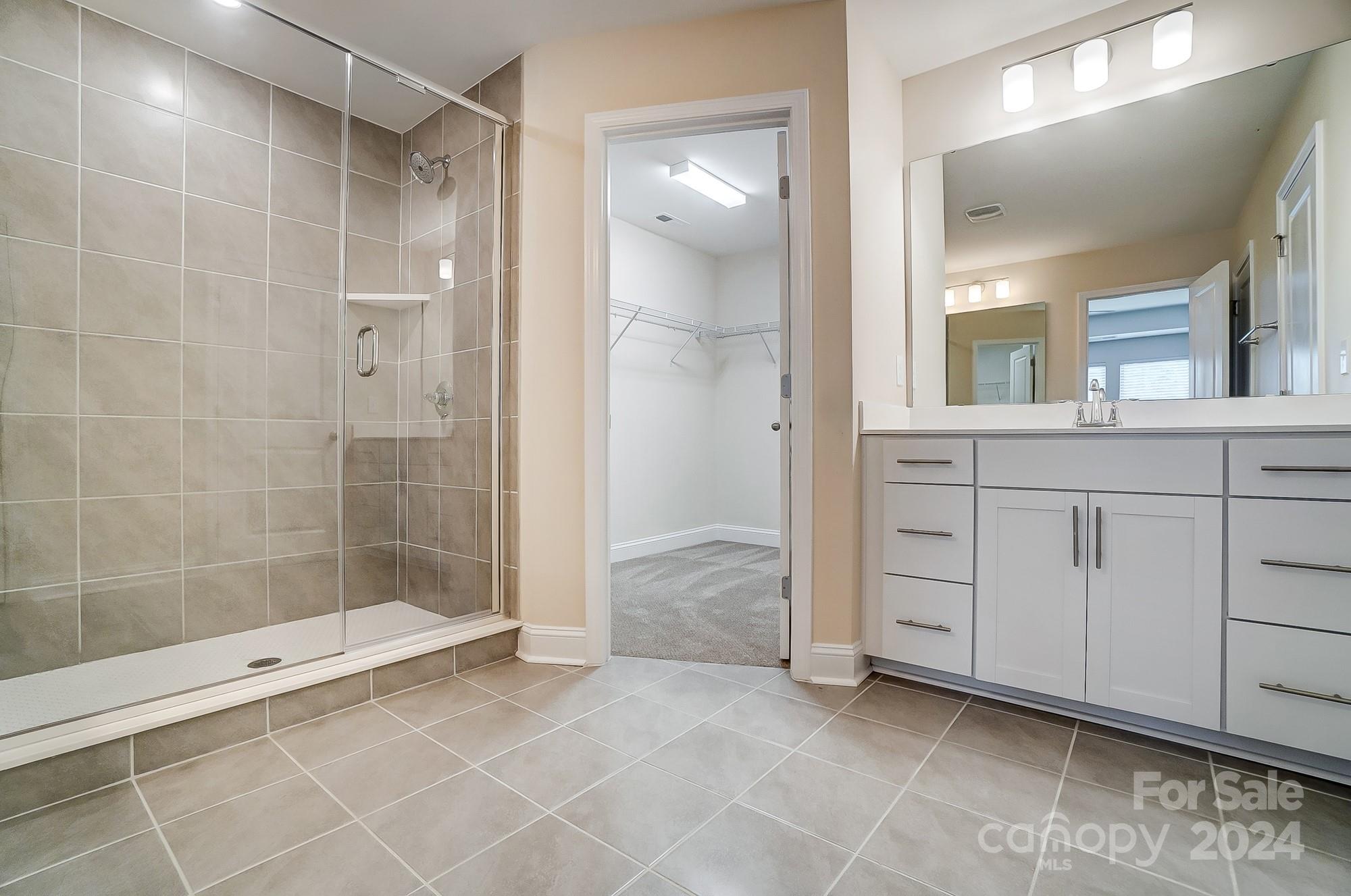 2059 Suttonview Road Fort Mill, SC 29708 - Photo 27 of 44 a bathroom with a shower and a sink