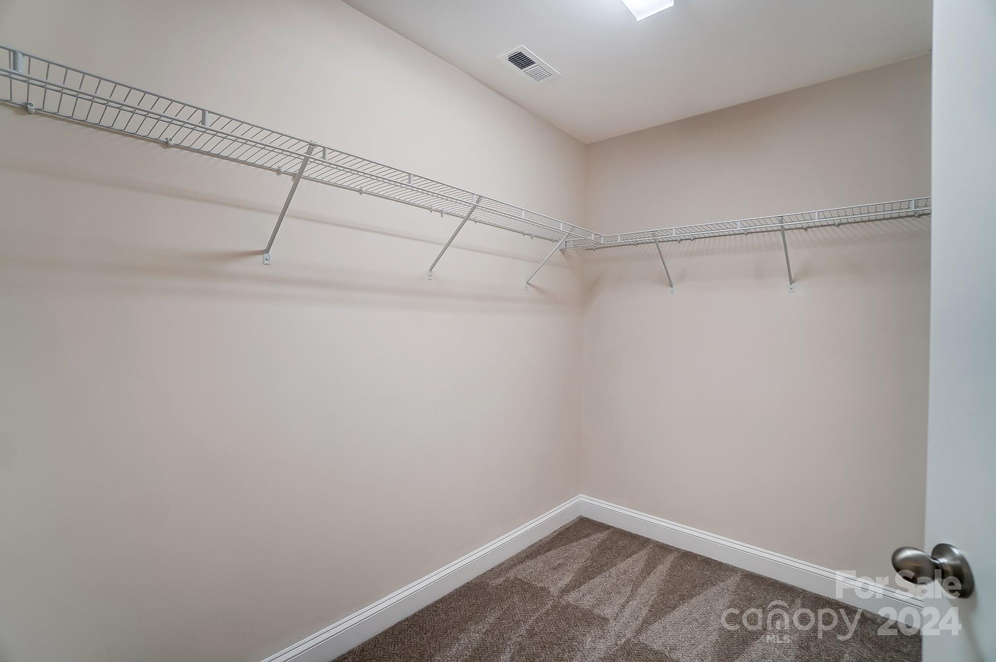2059 Suttonview Road Fort Mill, SC 29708 - Photo 30 of 44 a view of a room with racks on the wall