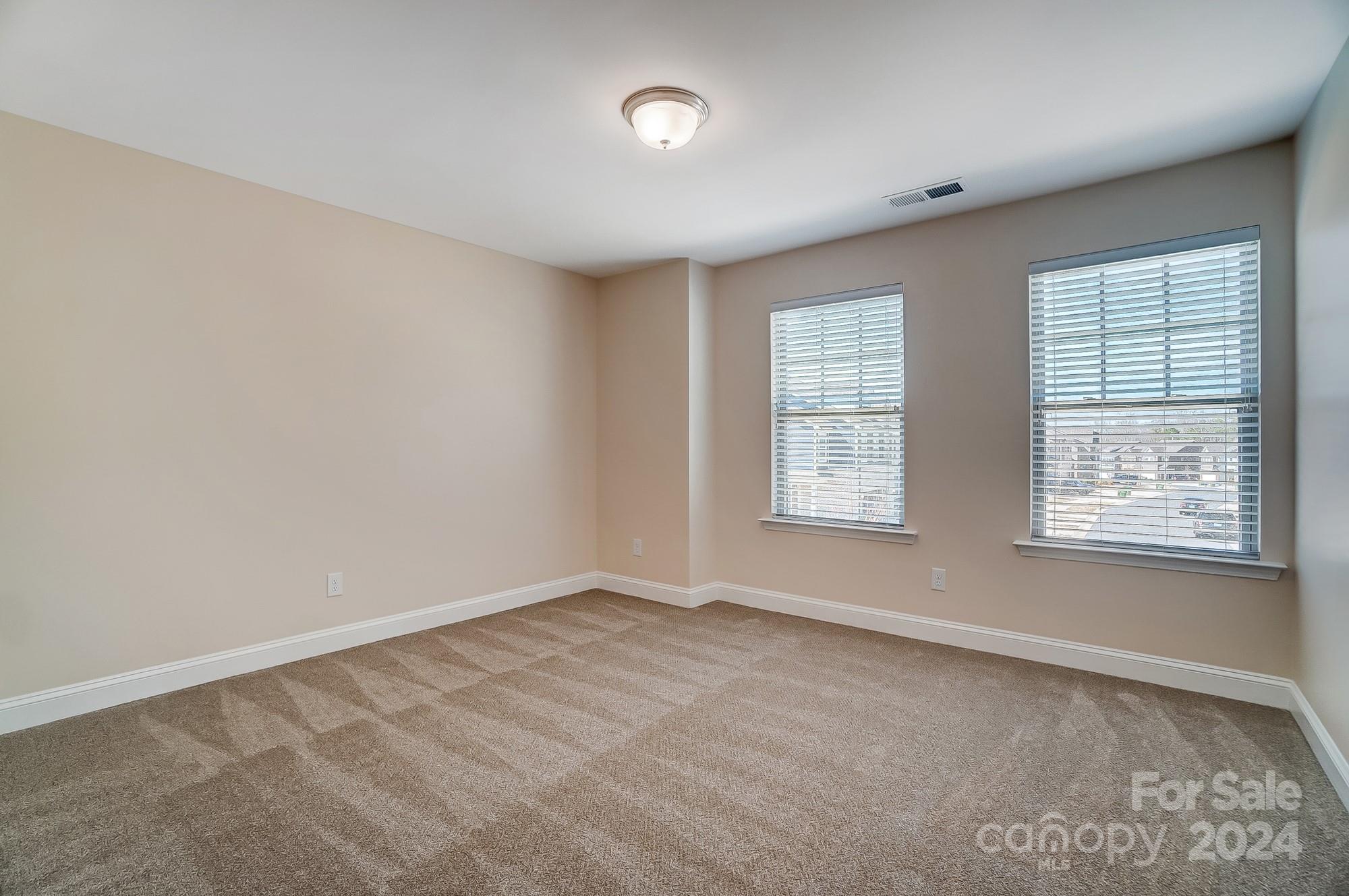 2059 Suttonview Road Fort Mill, SC 29708 - Photo 34 of 44 a view of an empty room with a window