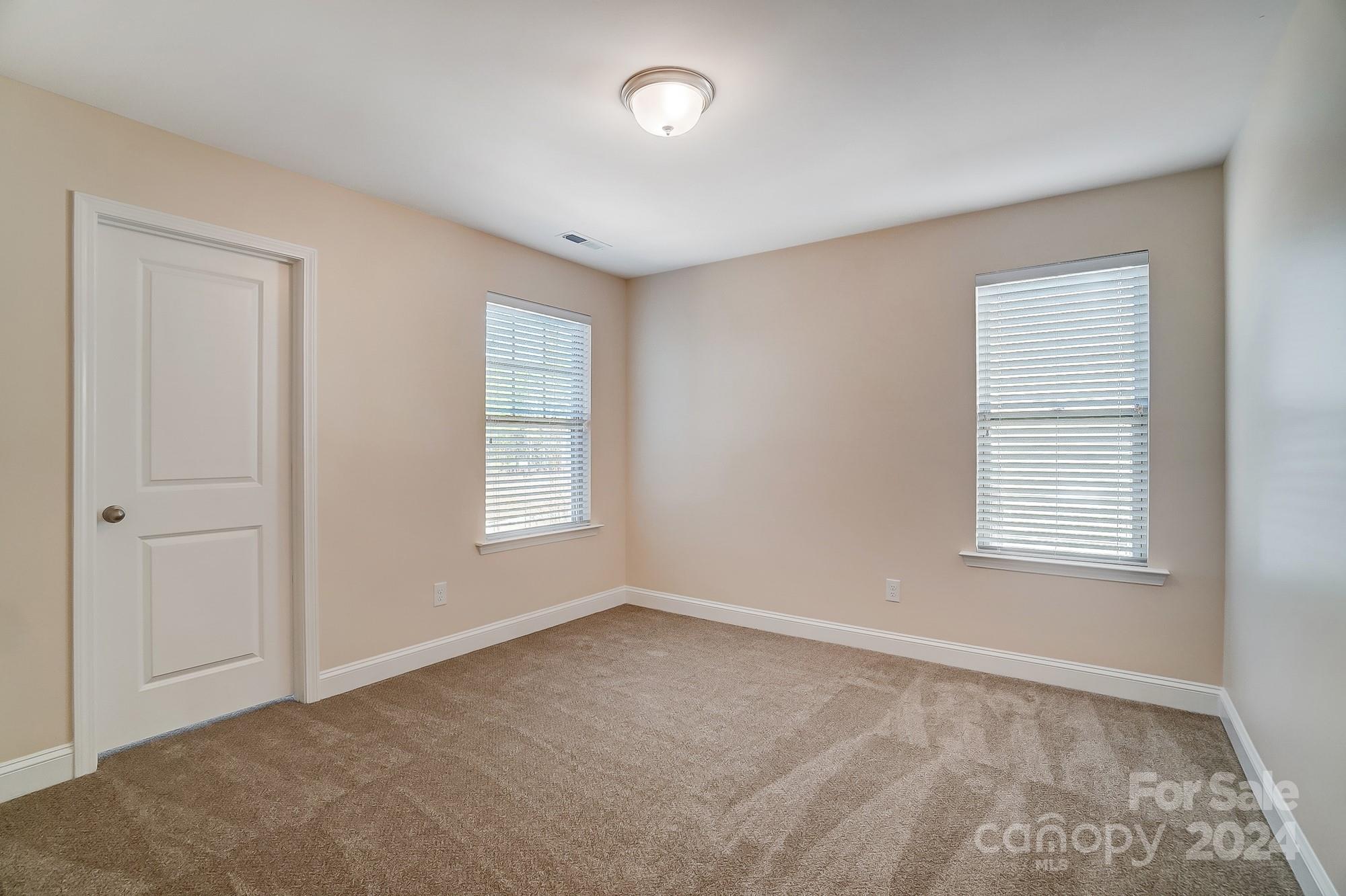 2059 Suttonview Road Fort Mill, SC 29708 - Photo 38 of 44 a view of an empty room with a window