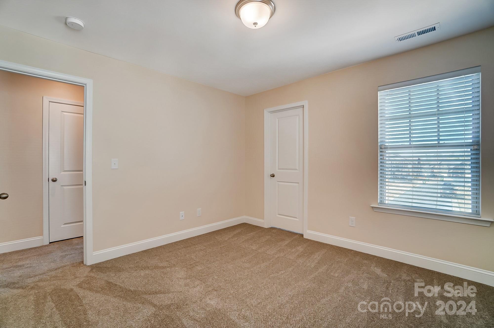 2059 Suttonview Road Fort Mill, SC 29708 - Photo 39 of 44 a view of an empty room with a window
