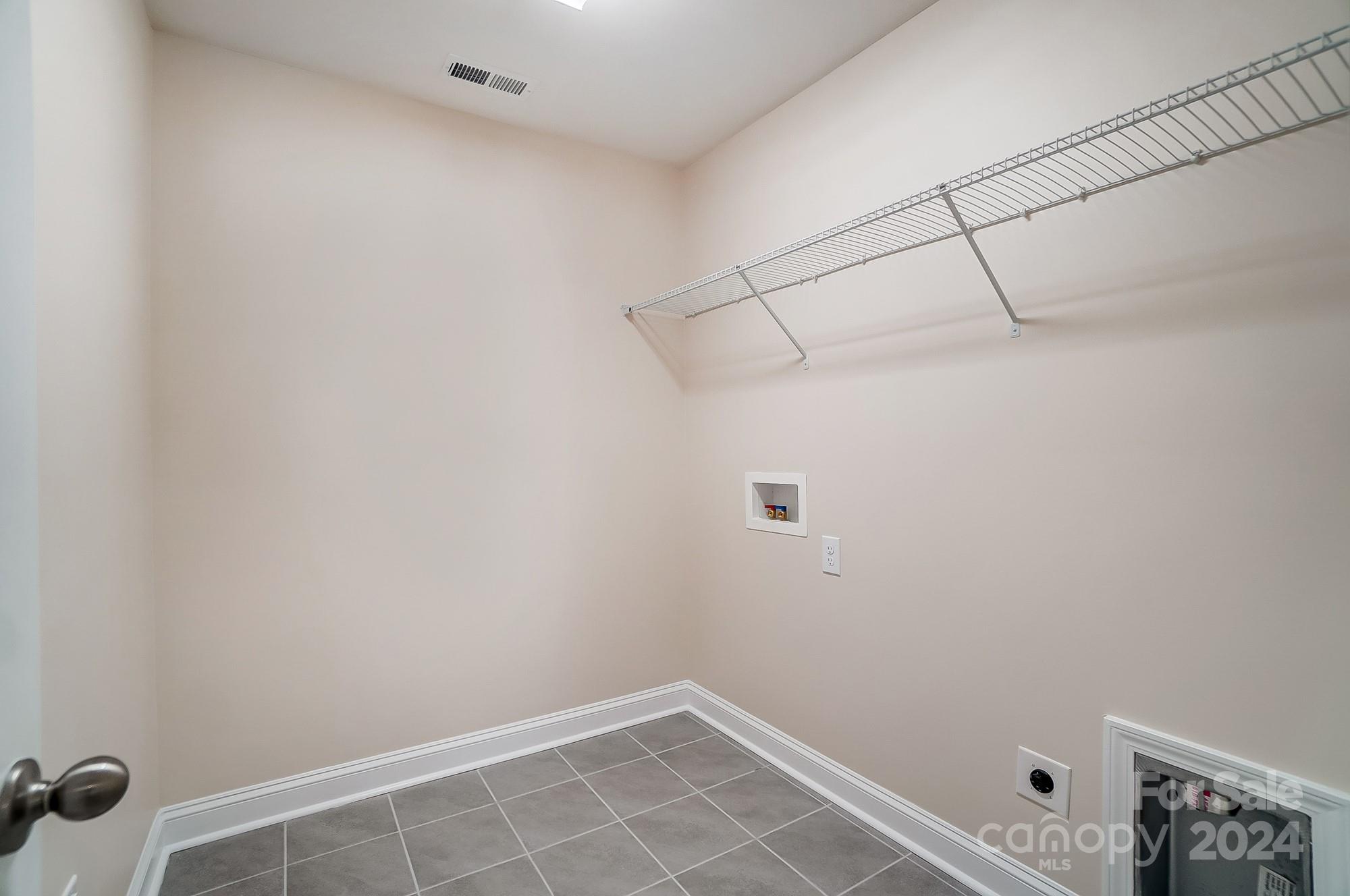 2059 Suttonview Road Fort Mill, SC 29708 - Photo 40 of 44 a view of a room with racks on the wall