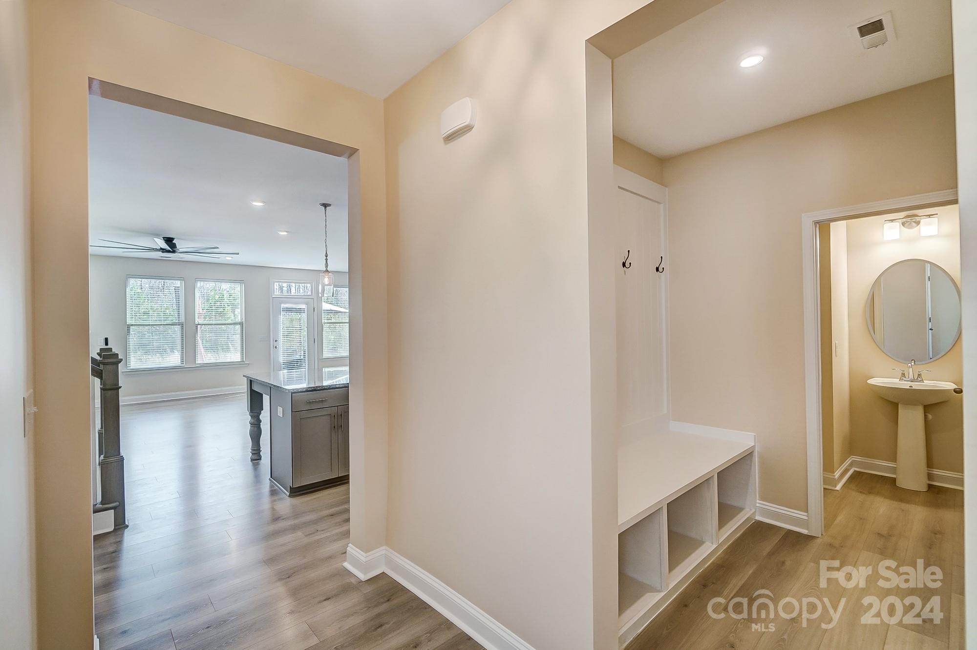 2059 Suttonview Road Fort Mill, SC 29708 - Photo 9 of 44 a view of utility room and wooden floor