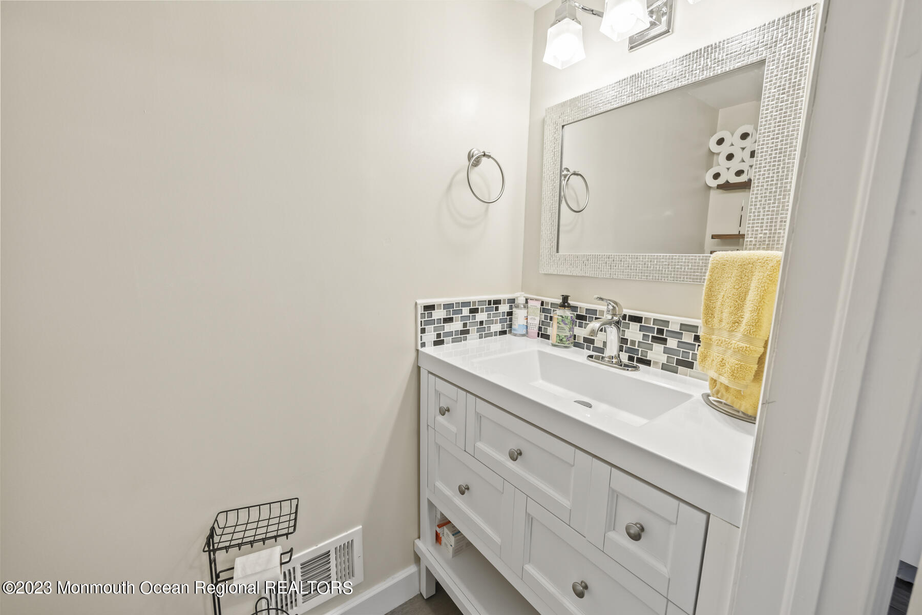 12 Constitution Drive Howell, NJ 07731 - Photo 17 of 39 a bathroom with a sink and a mirror