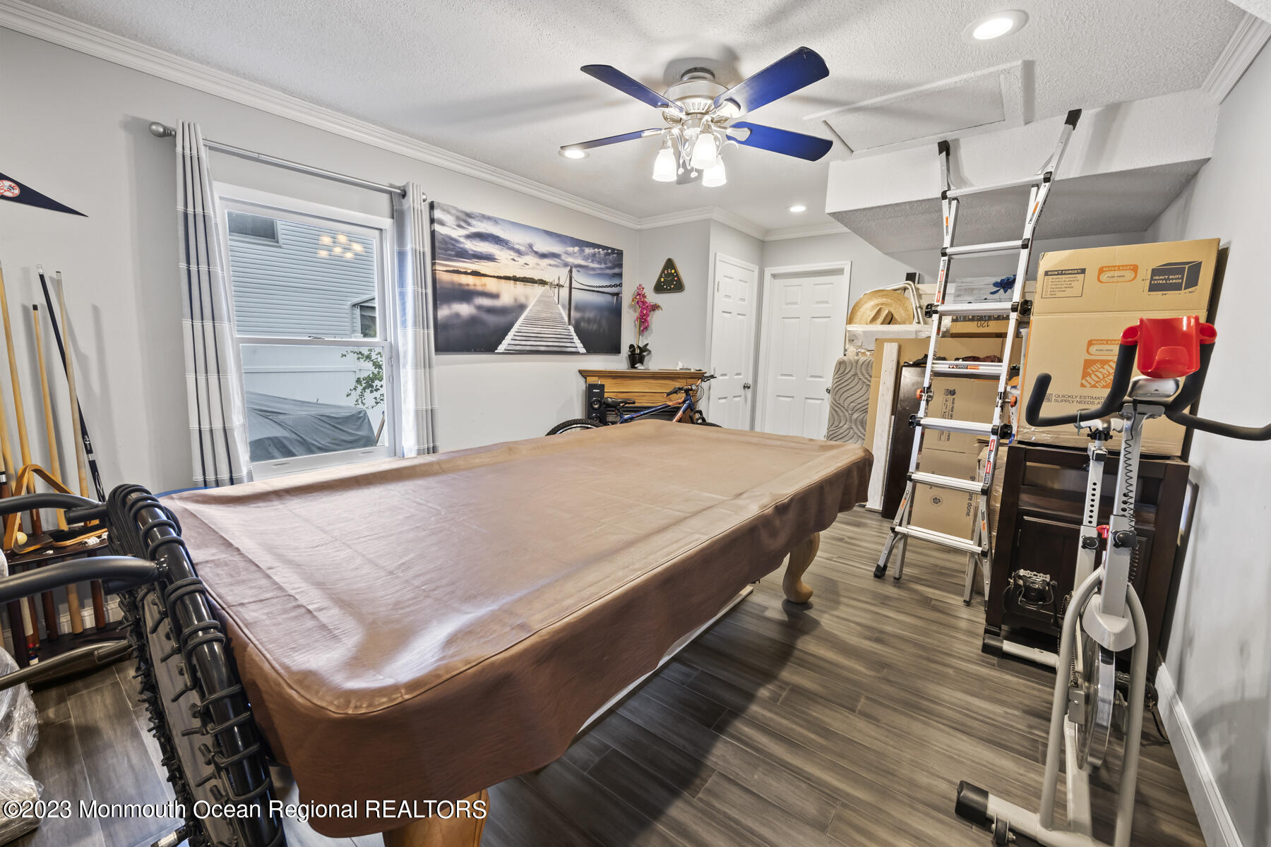 12 Constitution Drive Howell, NJ 07731 - Photo 20 of 39 a bed room with a bed furniture and a flat screen tv