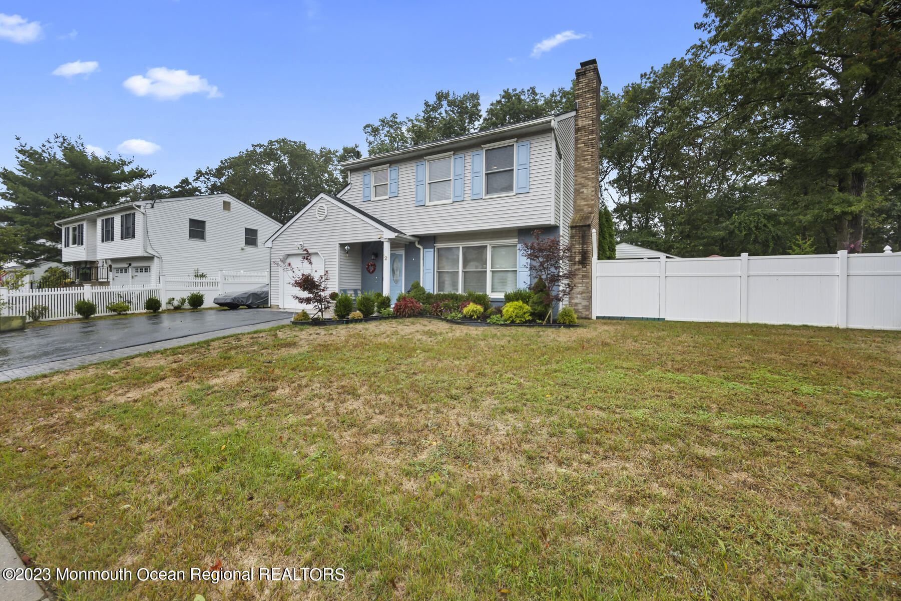 12 Constitution Drive Howell, NJ 07731 - Photo 2 of 39 a front view of a house with a yard