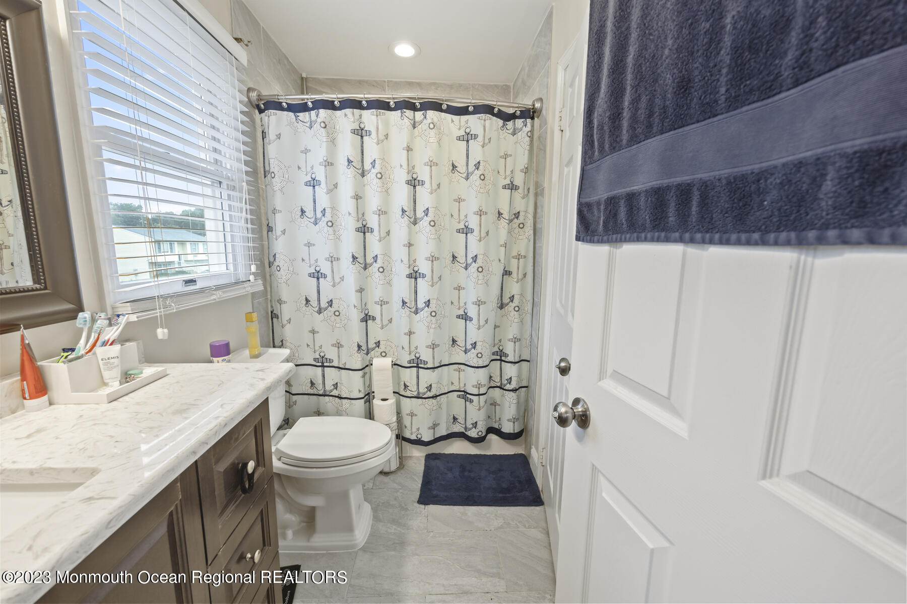 12 Constitution Drive Howell, NJ 07731 - Photo 31 of 39 a bathroom with a granite countertop sink toilet and shower