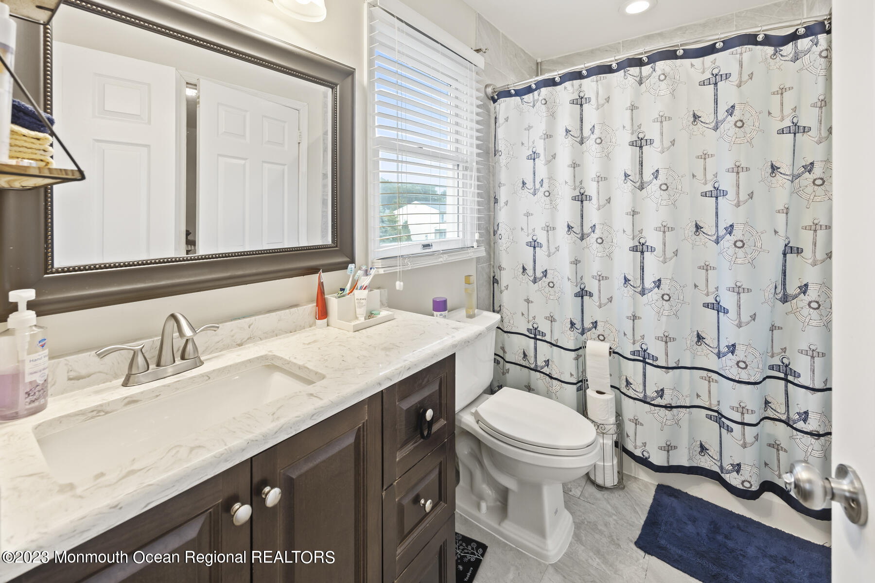 12 Constitution Drive Howell, NJ 07731 - Photo 32 of 39 a bathroom with a granite countertop sink toilet and shower
