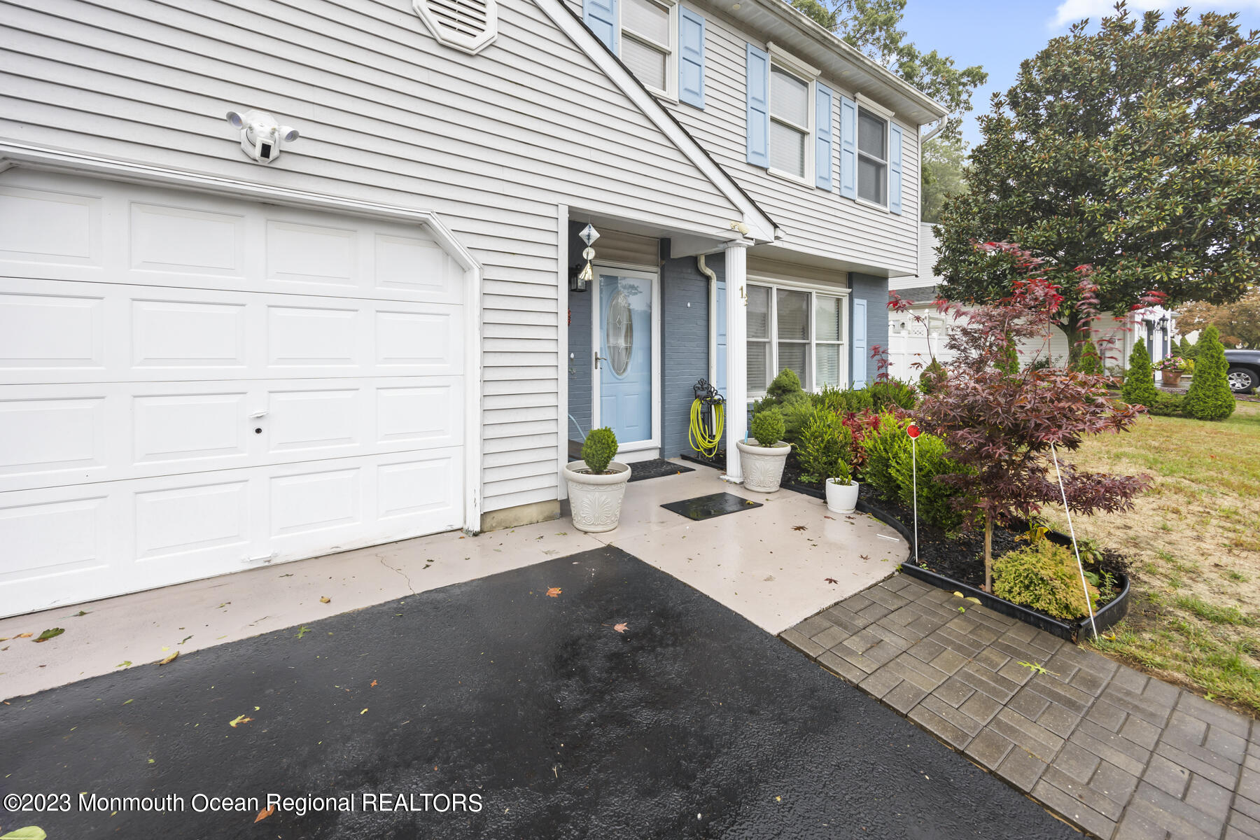 12 Constitution Drive Howell, NJ 07731 - Photo 33 of 39 a view of a house with a backyard and garden