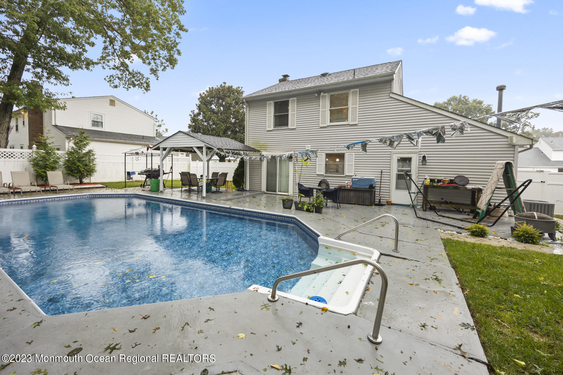 12 Constitution Drive Howell, NJ 07731 - Photo 36 of 39 a view of a house with pool and chairs