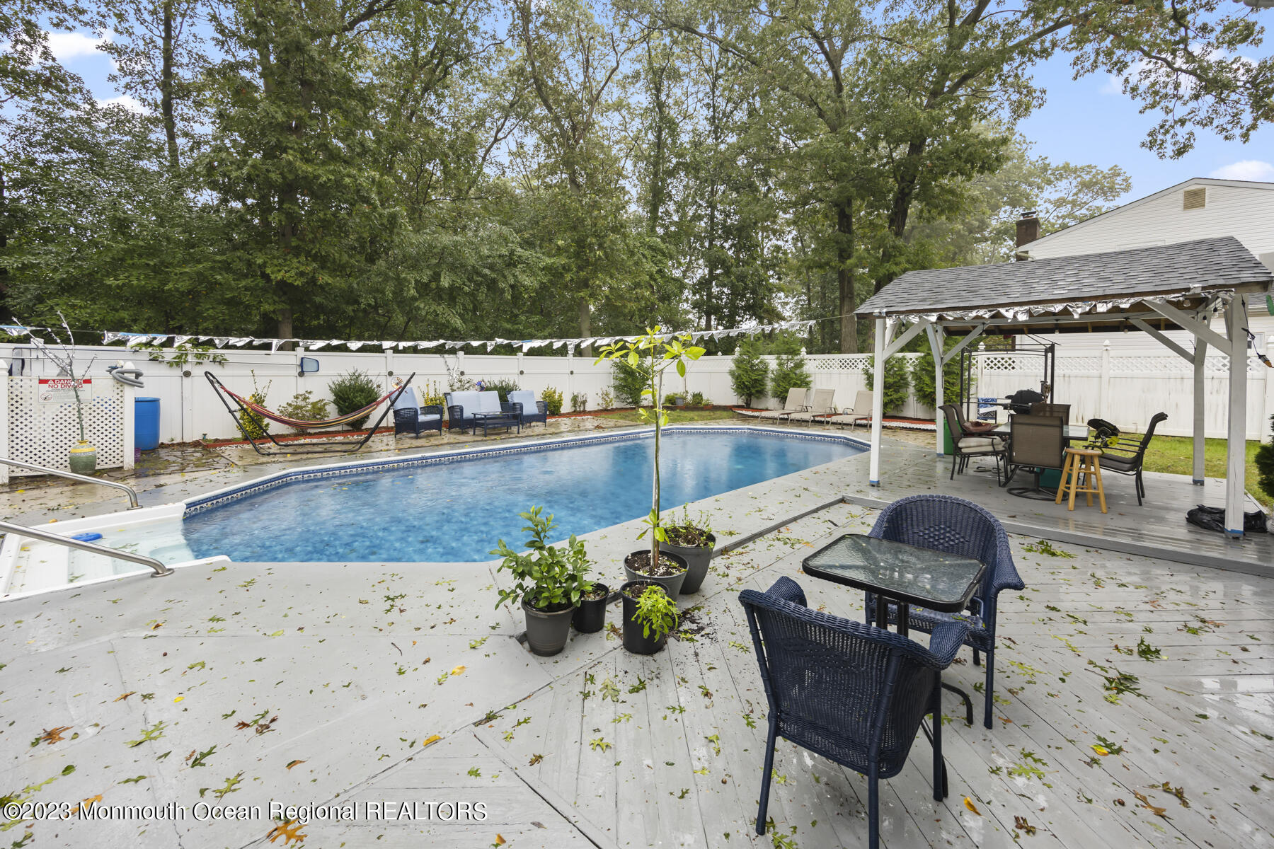 12 Constitution Drive Howell, NJ 07731 - Photo 39 of 39 a view of a chairs and table in the patio