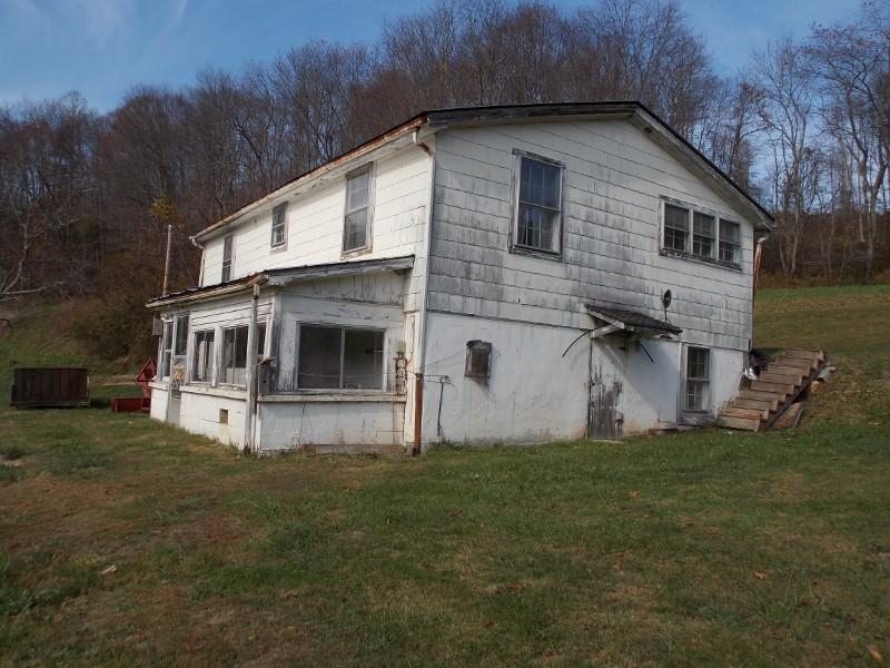 223 Weddle Road Southwest Willis, VA 24380 - Photo 34 of 47 a front view of a house with a yard