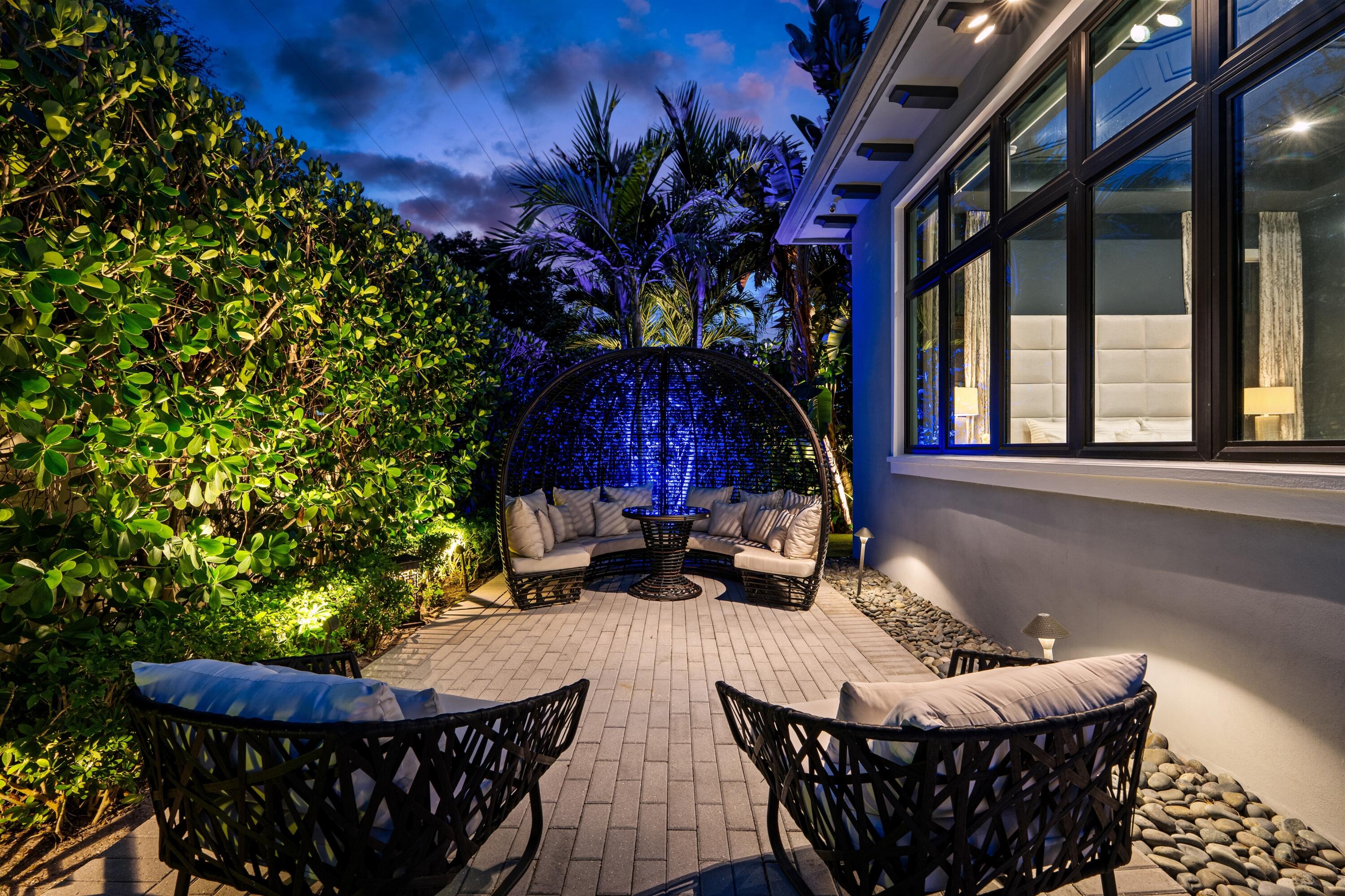 904 Northwest 2nd Street Boca Raton, FL 33486 - Photo 37 of 41 PATIO_SEATING_TWILIGHT