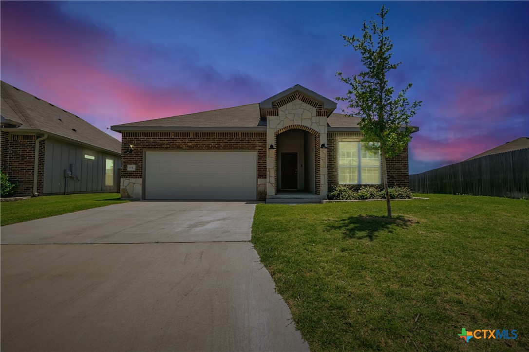 631 Friar Tuck Drive Temple, TX 76502 - Photo 2 of 36 a front view of a house with a yard and garage
