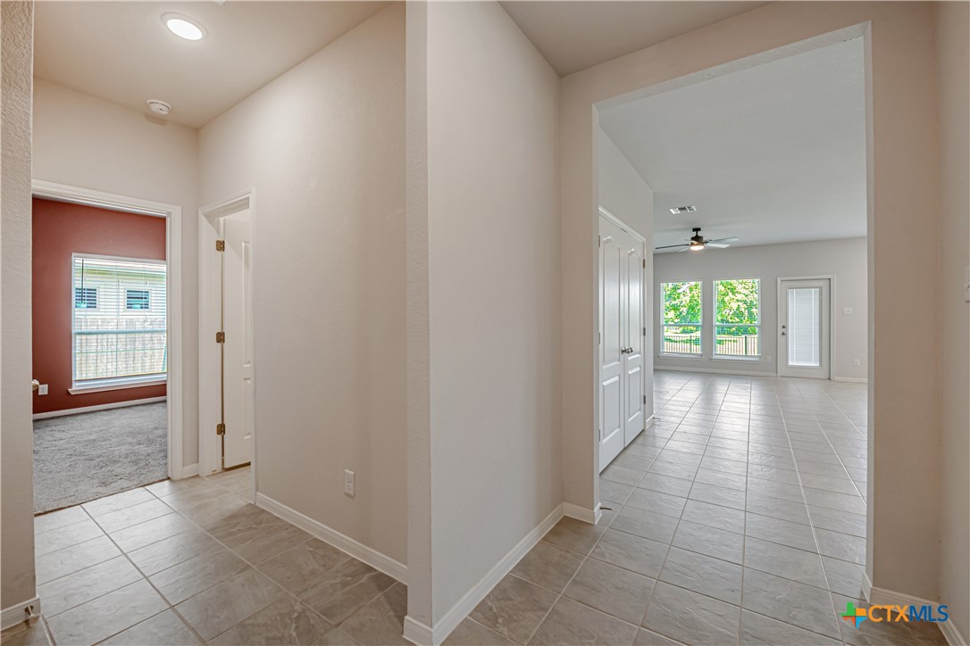 631 Friar Tuck Drive Temple, TX 76502 - Photo 23 of 36 an empty room with windows and entrance