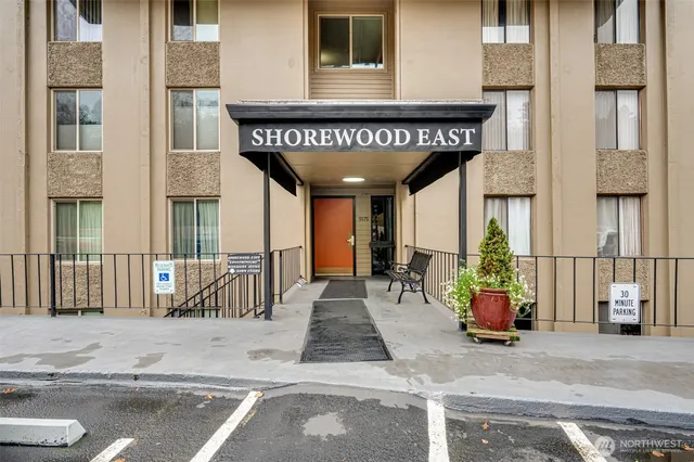 a view of a patio with table and chairs