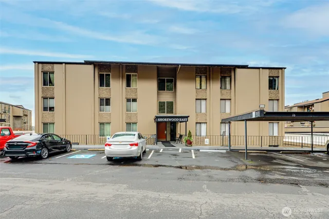 a view of car parked in front of house