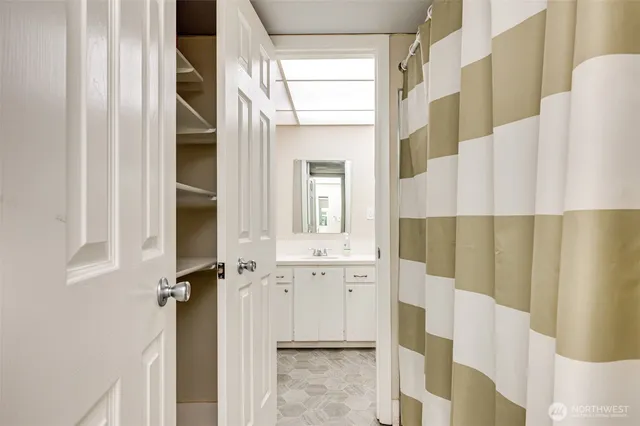 a view of a kitchen with cabinets